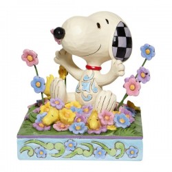 Snoopy in bed of Flowers Figurine